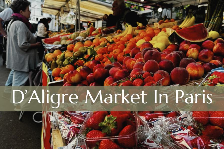 D’Aligre Market in Paris Blog Banner Image featuring a Woman shopping for produce. 